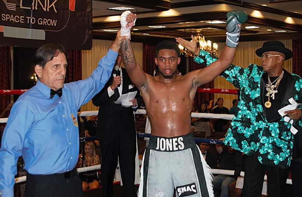 Amari Jones hand raised in victory