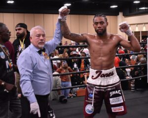 Jones Dominates in Home Debut